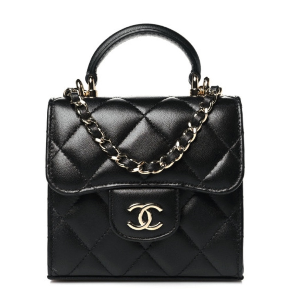 CHANEL Black Mini Quilted Bag with Silver Chain